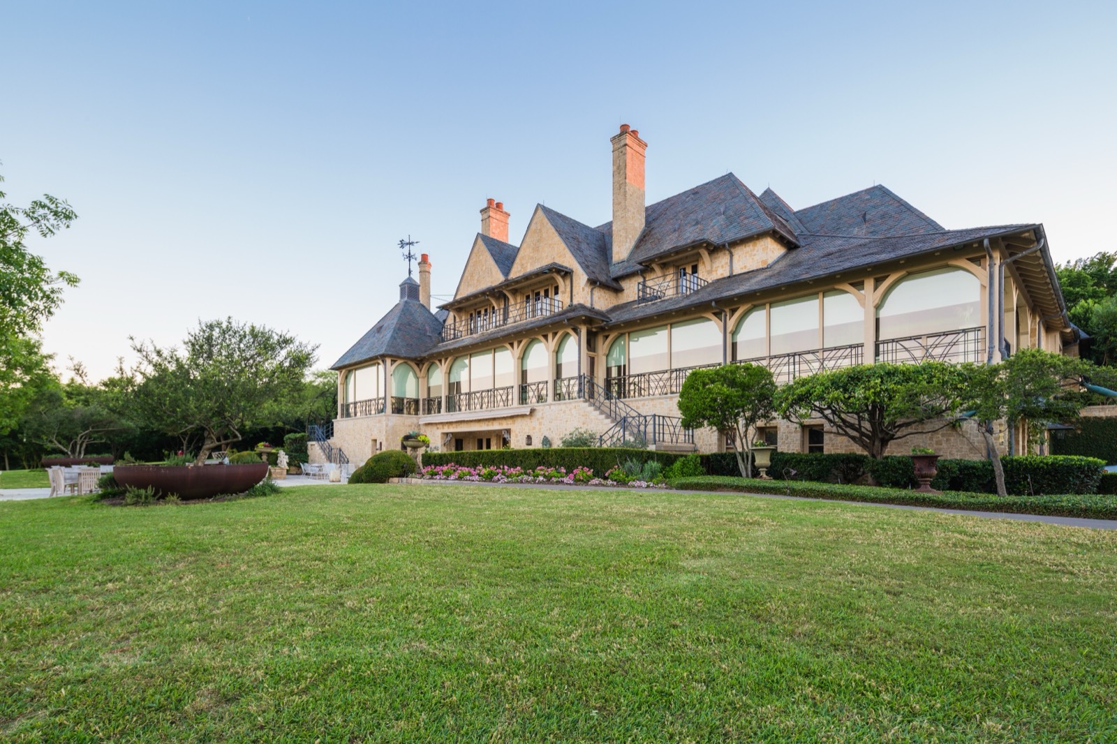 Lawn and rear elevation of the ranch house at South Creek Ranch
